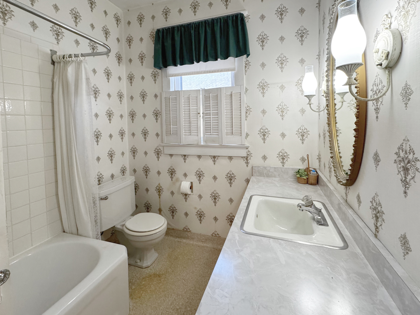 333 Elm Street Elgin, IL 60123 - Photo 14 of 25 a bathroom with a sink a toilet and shower