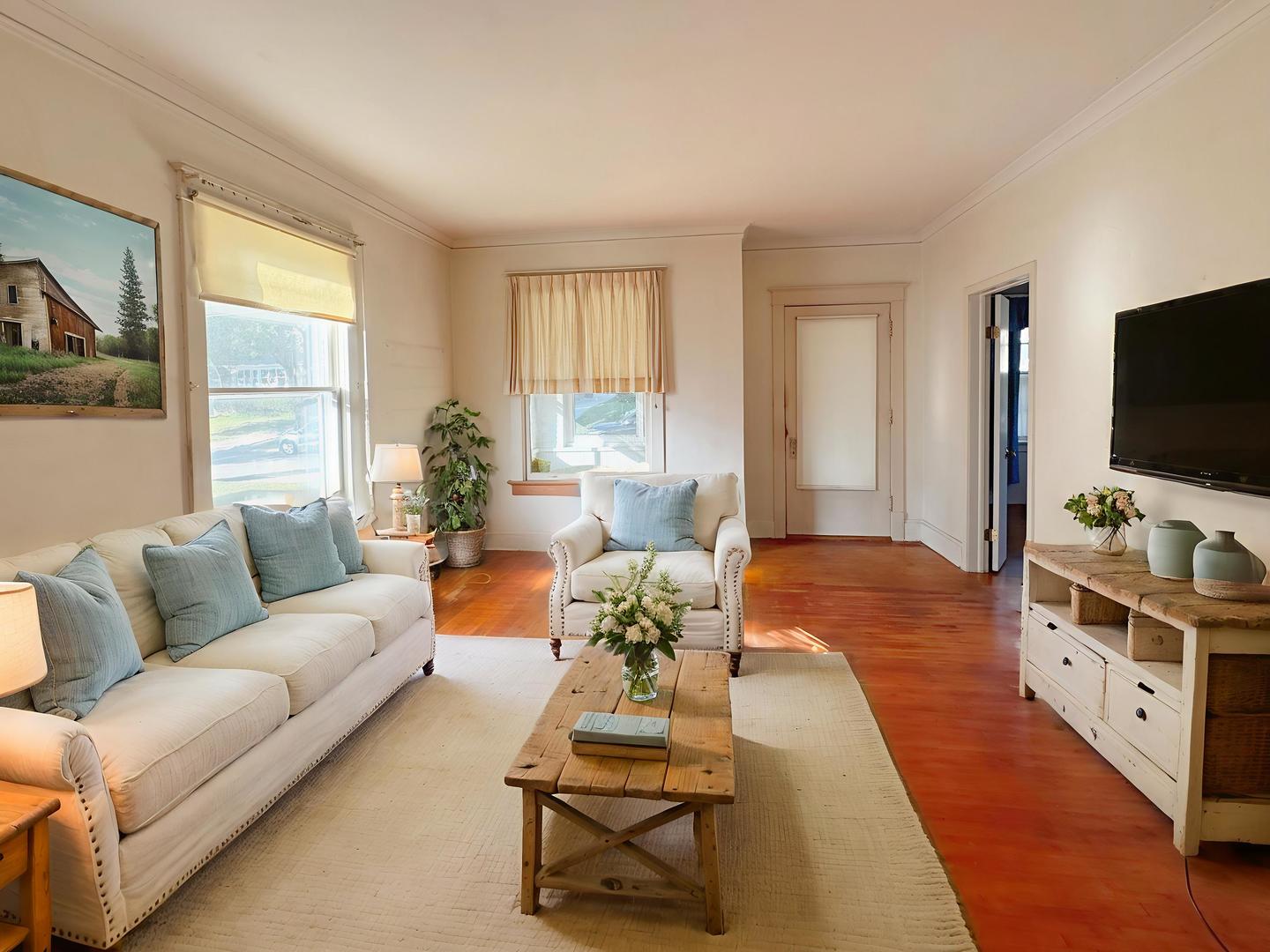 333 Elm Street Elgin, IL 60123 - Photo 3 of 25 a living room with furniture and a flat screen tv