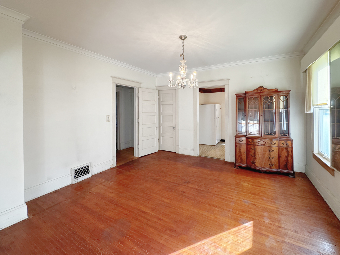 333 Elm Street Elgin, IL 60123 - Photo 7 of 25 a view of a room with wooden floor closet and windows