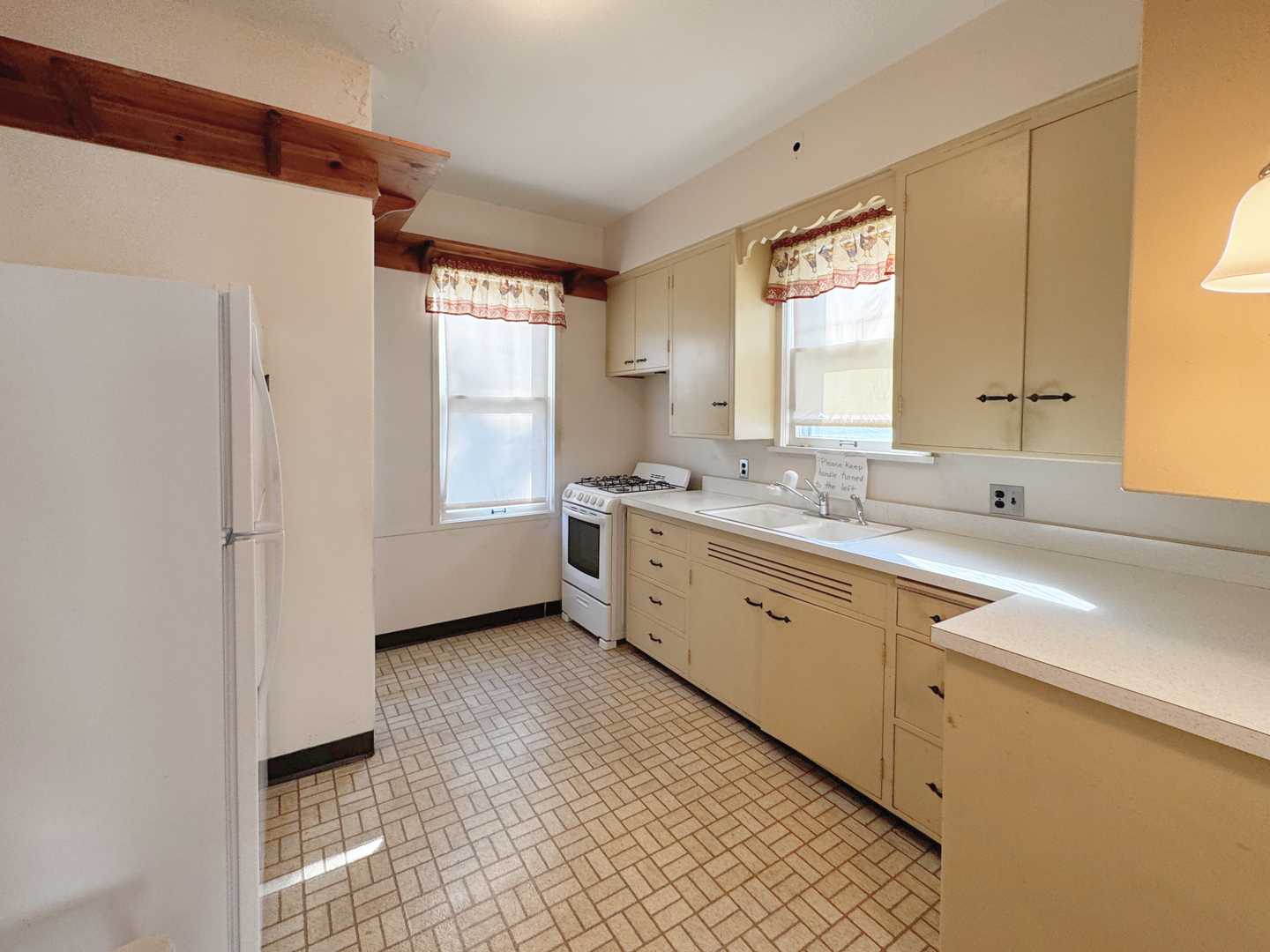 333 Elm Street Elgin, IL 60123 - Photo 9 of 25 a spacious bathroom with a double vanity sink a mirror and a bathtub
