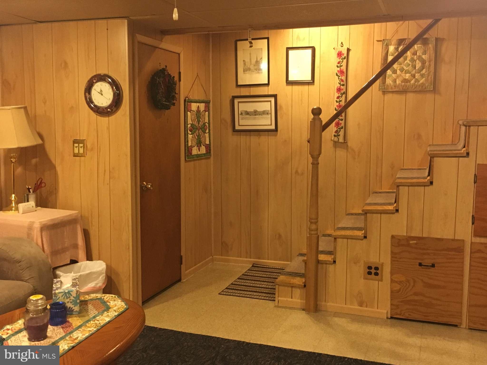 6010 Falkirk Road Baltimore, MD 21239 - Photo 23 of 30 a view of an entryway with wooden floor