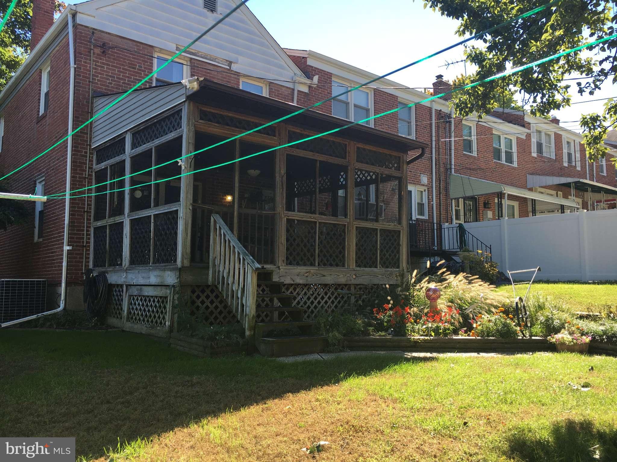 6010 Falkirk Road Baltimore, MD 21239 - Photo 24 of 30 a view of a house with backyard and sitting area