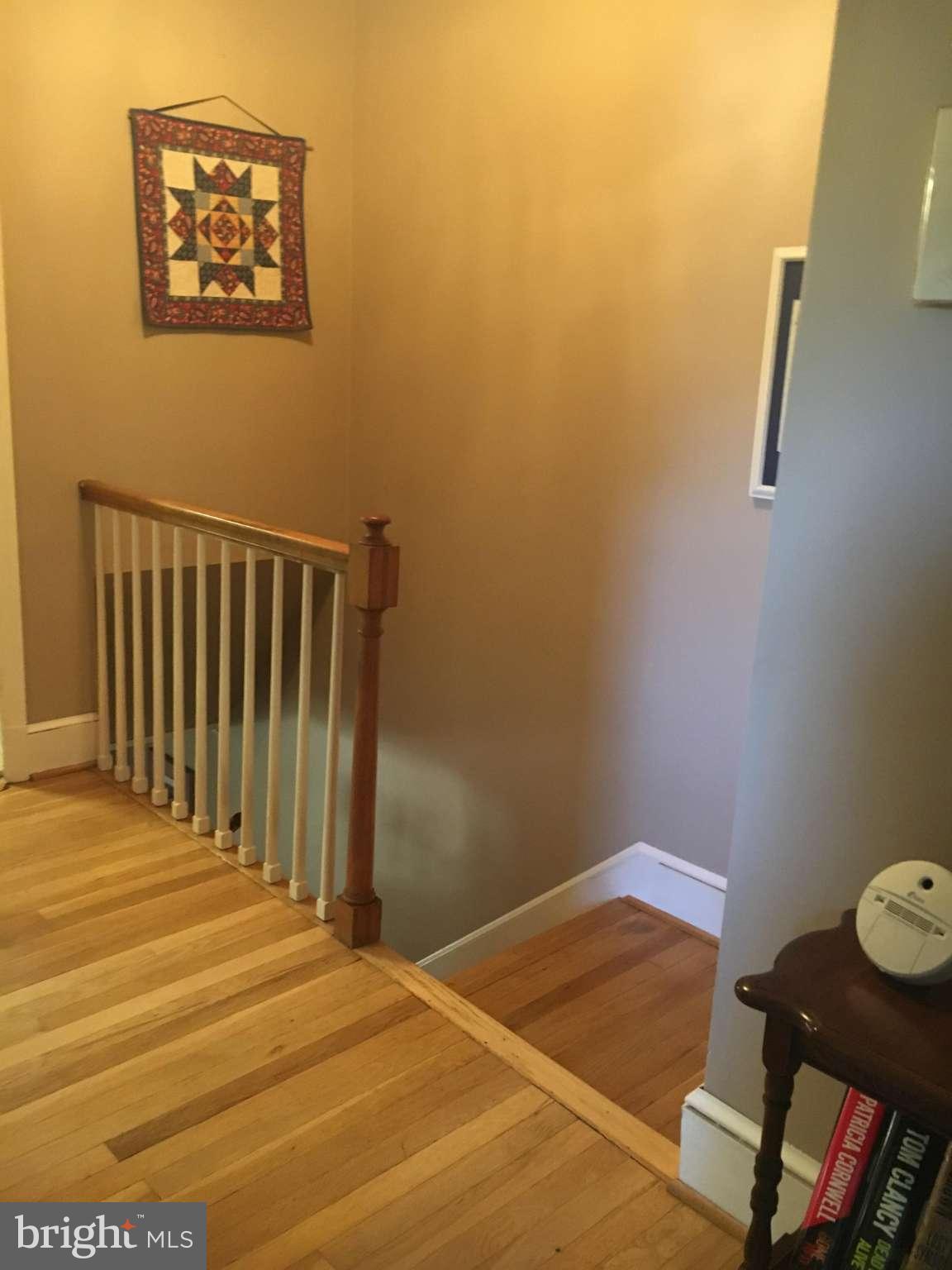 6010 Falkirk Road Baltimore, MD 21239 - Photo 29 of 30 a view of a room with wooden floor and bathroom