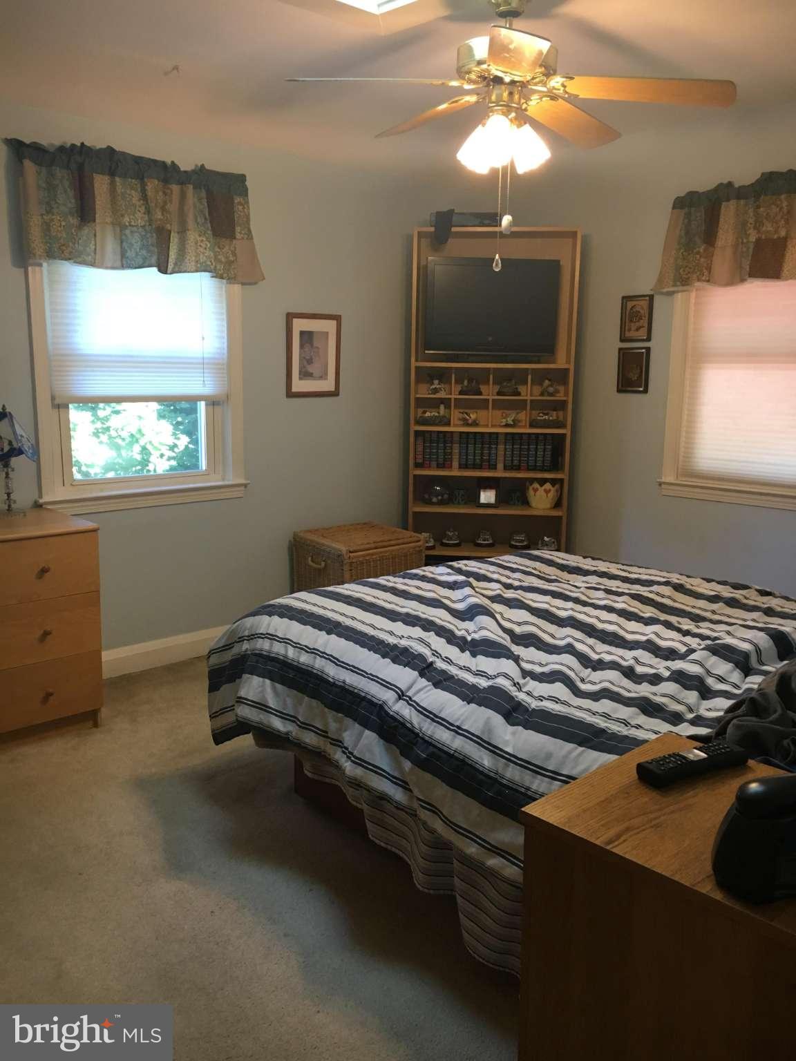 6010 Falkirk Road Baltimore, MD 21239 - Photo 7 of 30 a bedroom with bed and window