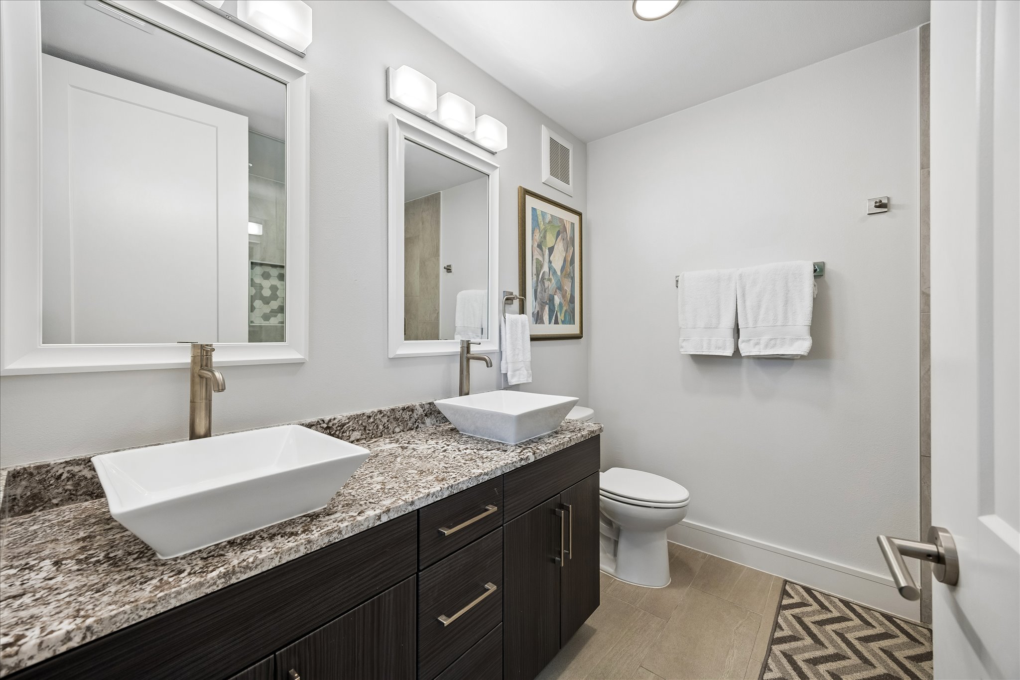 1715 Enfield Road, Unit 202 Austin, TX 78703 - Photo 24 of 30 Primary Bathroom with dual sinks
