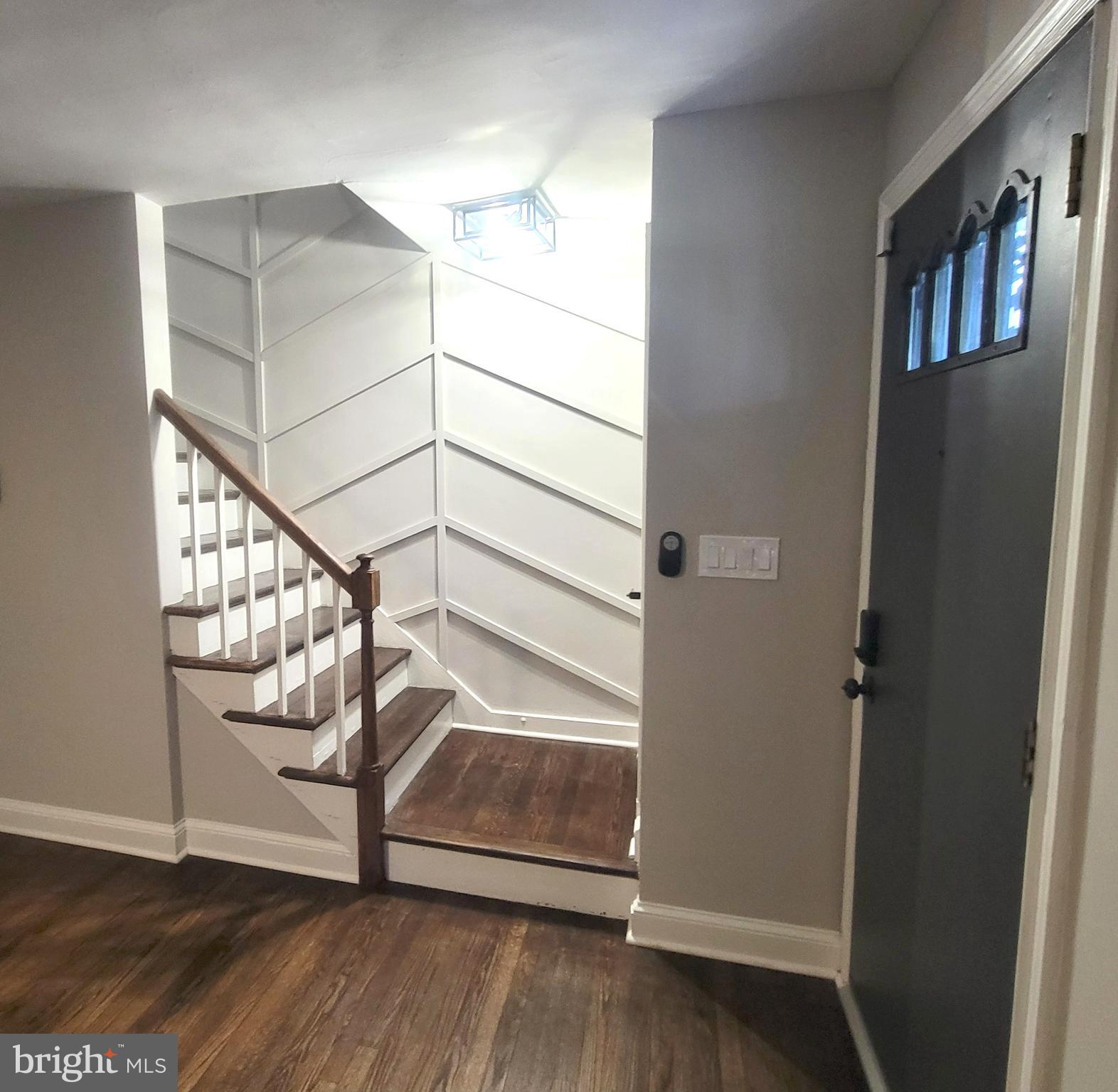 202 Edgewood Street Baltimore, MD 21229 - Photo 12 of 29 a view of entryway with wooden floor