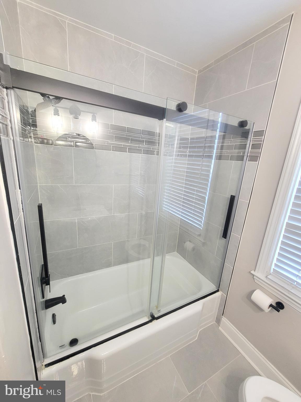 202 Edgewood Street Baltimore, MD 21229 - Photo 21 of 29 a bathroom with a shower