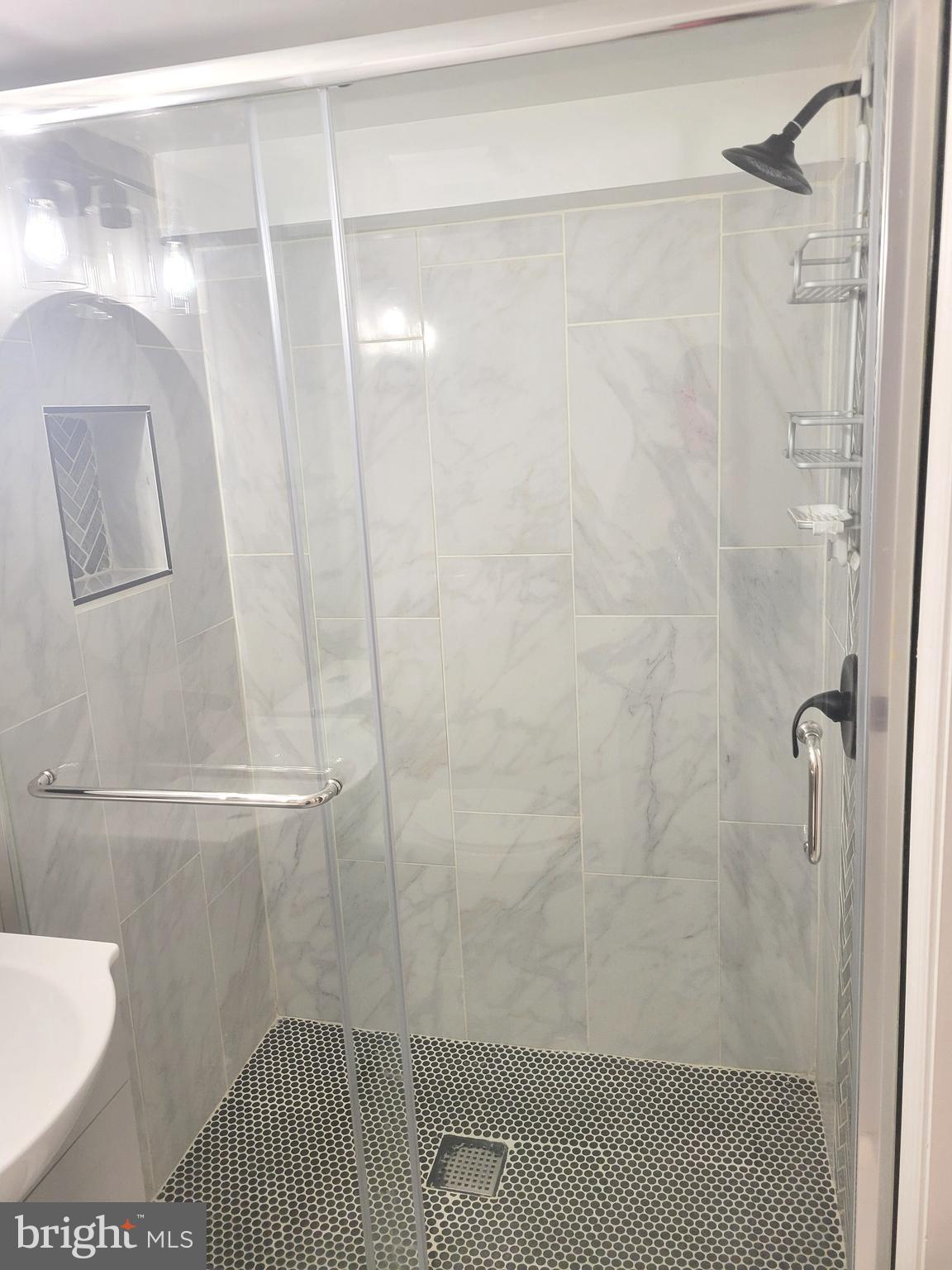 202 Edgewood Street Baltimore, MD 21229 - Photo 27 of 29 a bathroom with a shower