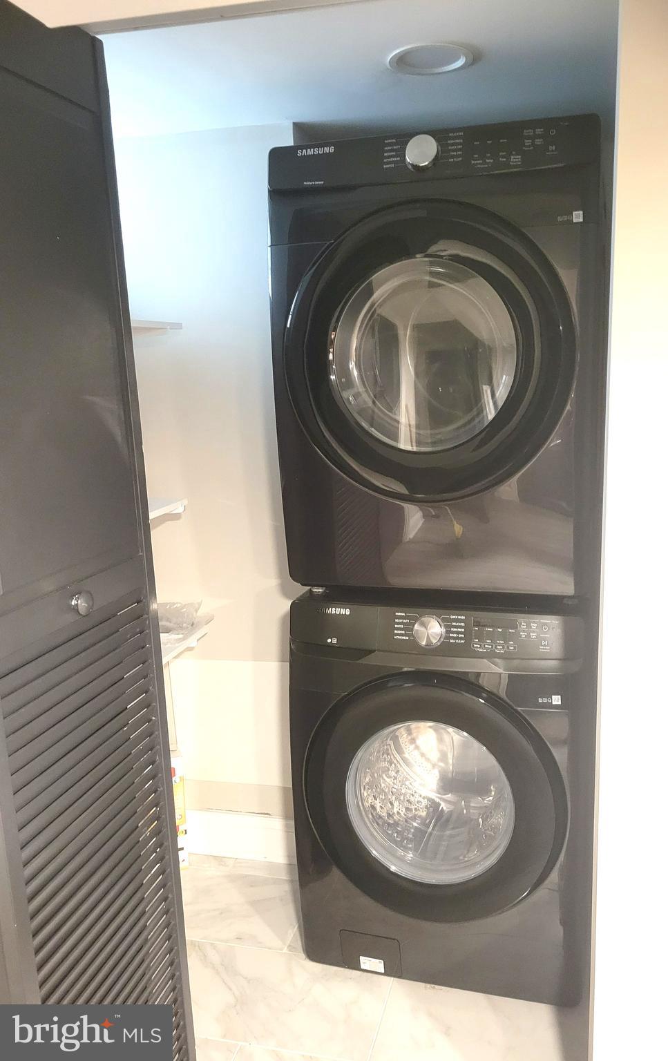 202 Edgewood Street Baltimore, MD 21229 - Photo 28 of 29 a washer and dryer sitting next to a sink