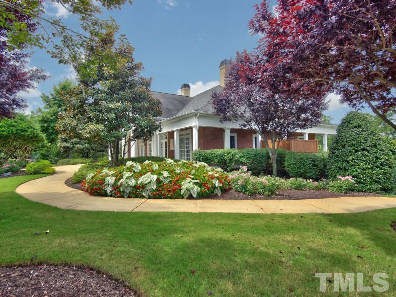 8523 Bright Loop Raleigh, NC 27613 - Photo 21 of 23 a view of a house with a garden