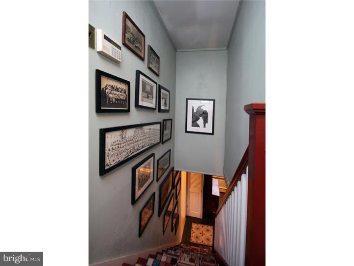 7400 Ferry Road New Hope, PA 18938 - Photo 12 of 20 a view of a hallway with paintings on the wall