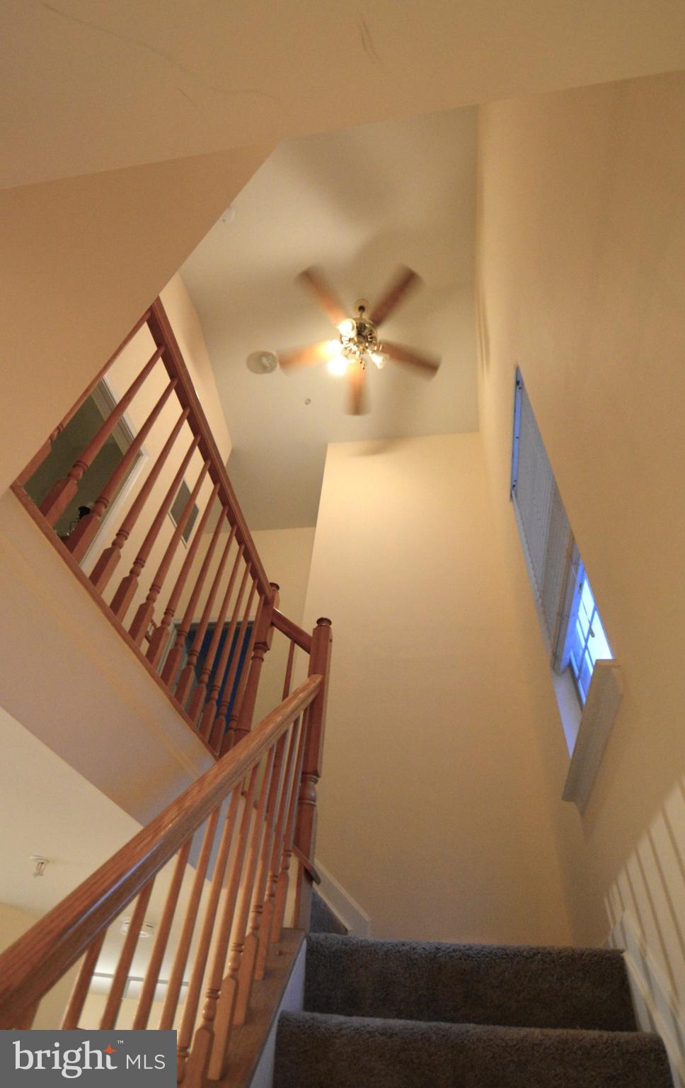 4701 Wainwright Circle Owings Mills, MD 21117 - Photo 16 of 59 Staircase to upper level