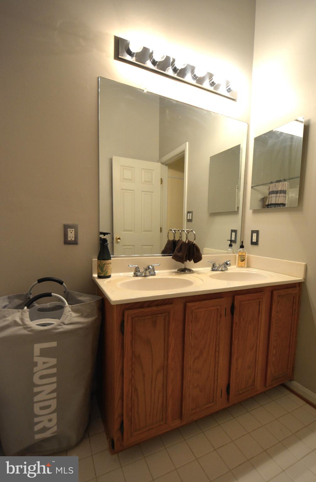 4701 Wainwright Circle Owings Mills, MD 21117 - Photo 27 of 59 Double bowl vanity in primary bathroom.