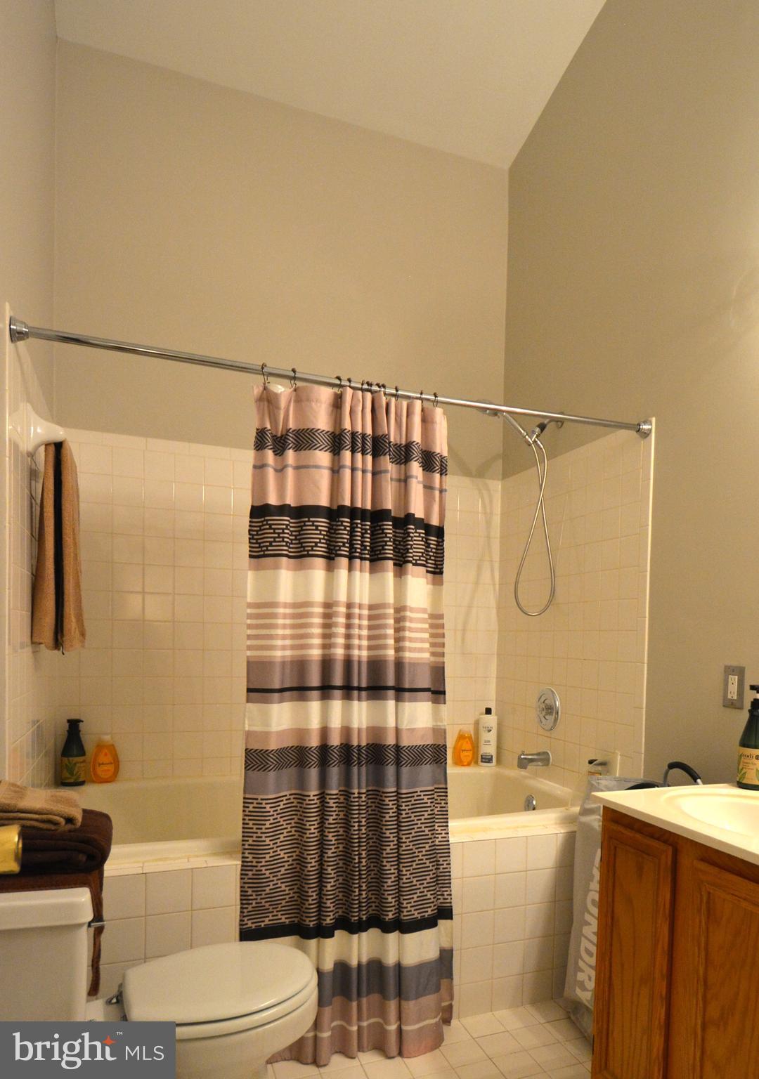 4701 Wainwright Circle Owings Mills, MD 21117 - Photo 28 of 59 Cathedral ceiling , white ceramic tile flooring.
