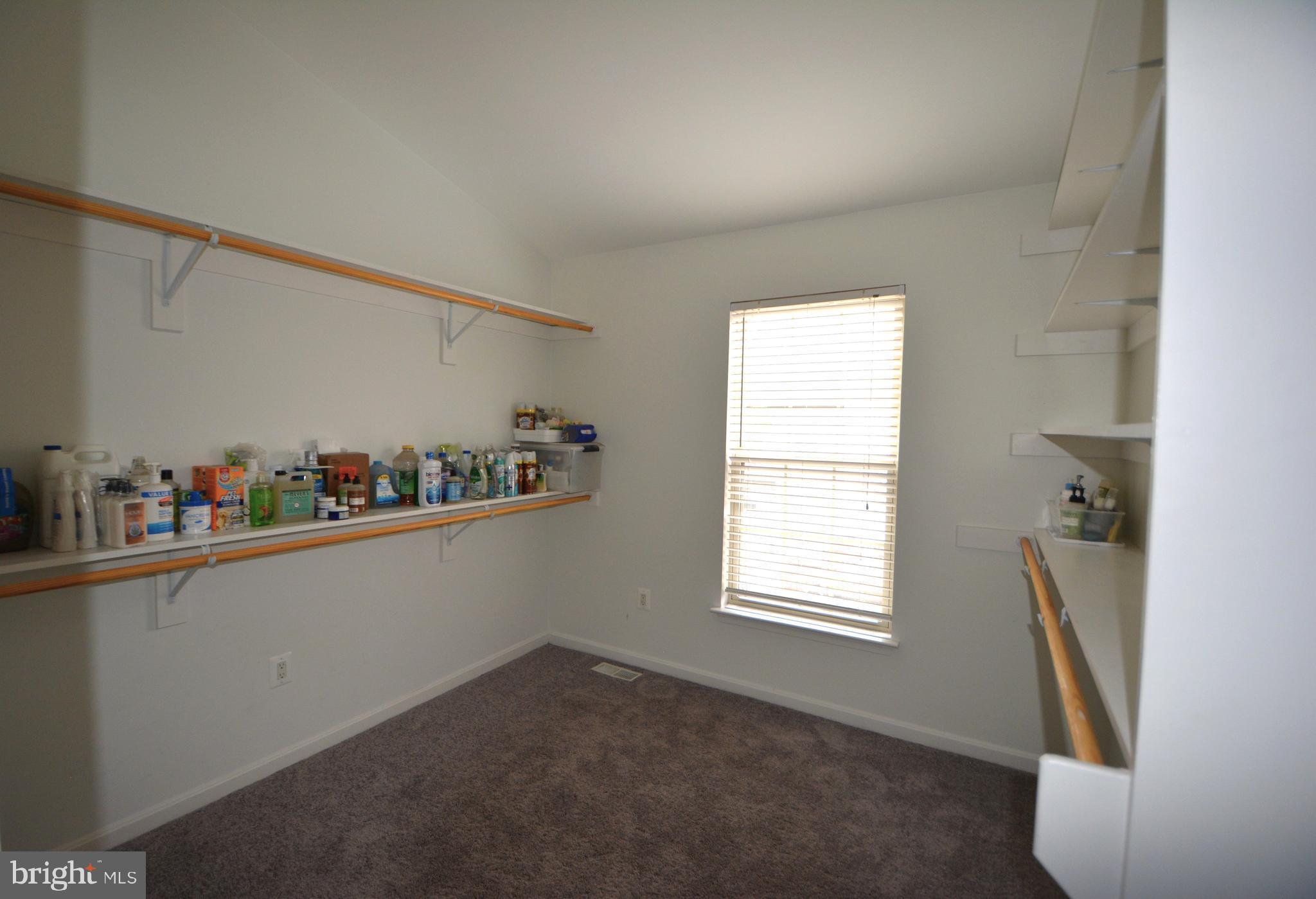 4701 Wainwright Circle Owings Mills, MD 21117 - Photo 30 of 59 Bedroom 2 custom built in shelving & hanging rods