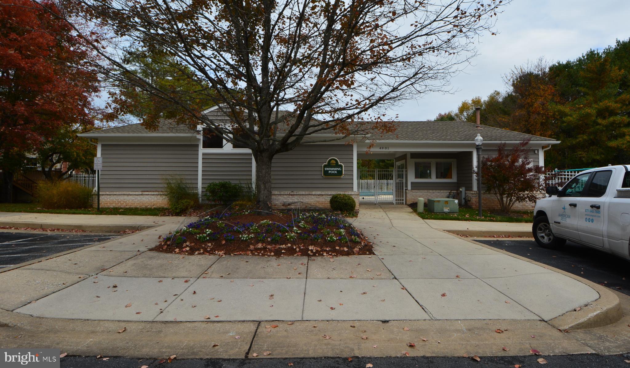 4701 Wainwright Circle Owings Mills, MD 21117 - Photo 52 of 59 Community pool entry. Very large parking lot.