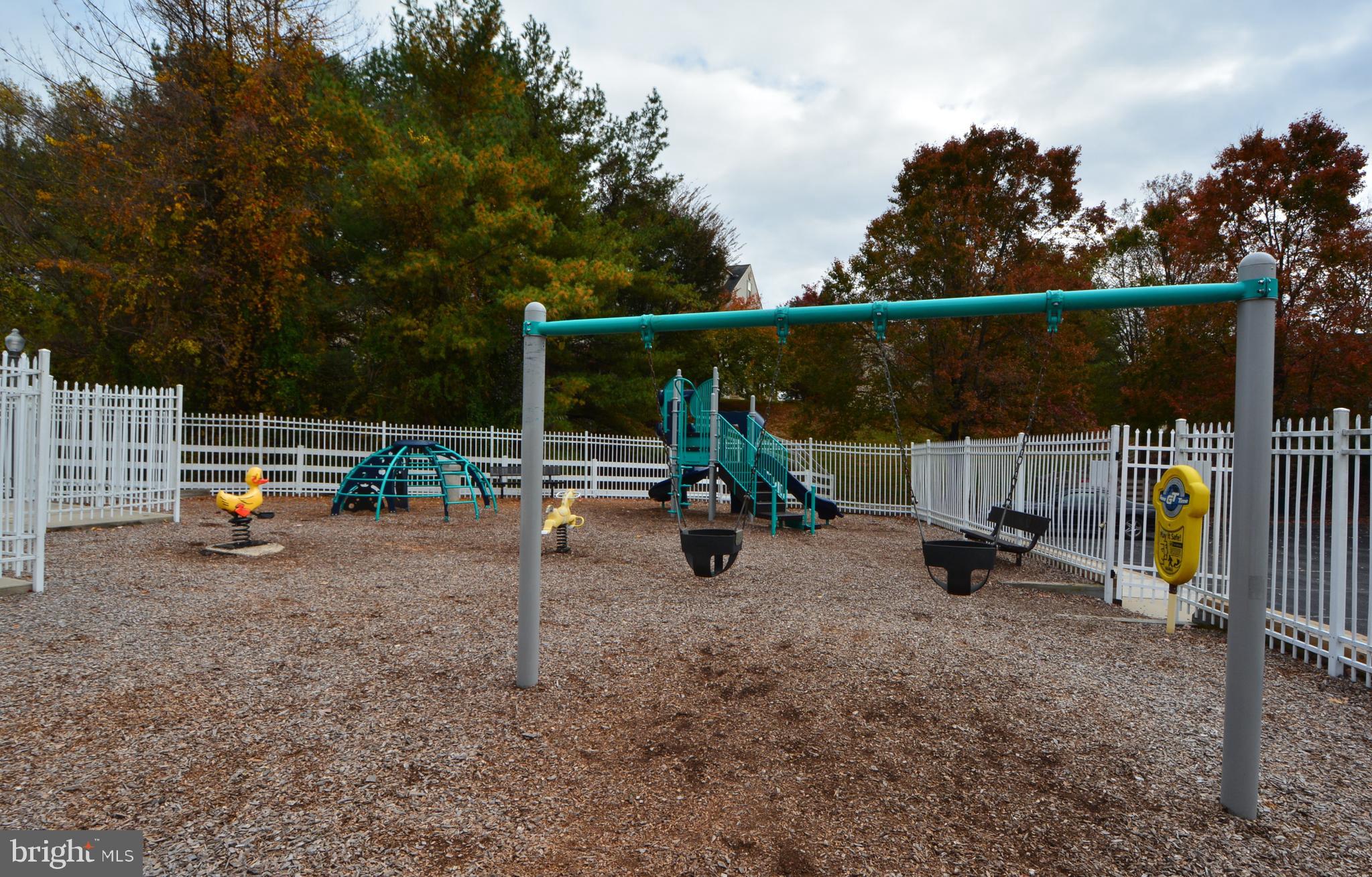 4701 Wainwright Circle Owings Mills, MD 21117 - Photo 55 of 59 Tot lot next to pools are fenced.