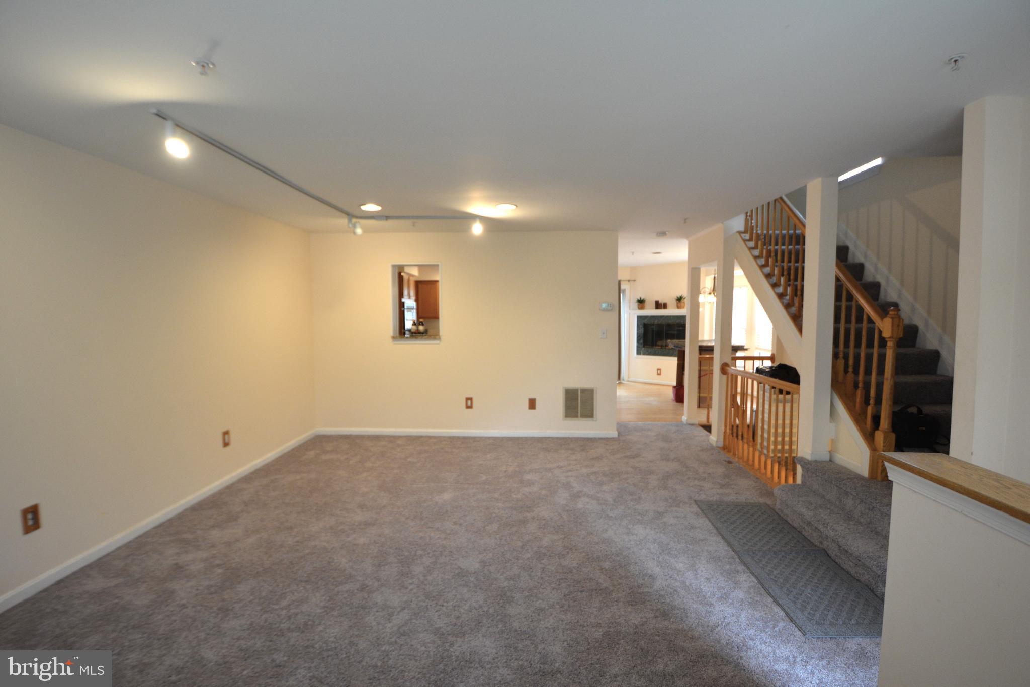 4701 Wainwright Circle Owings Mills, MD 21117 - Photo 8 of 59 Living room facing kitchen fireplace.