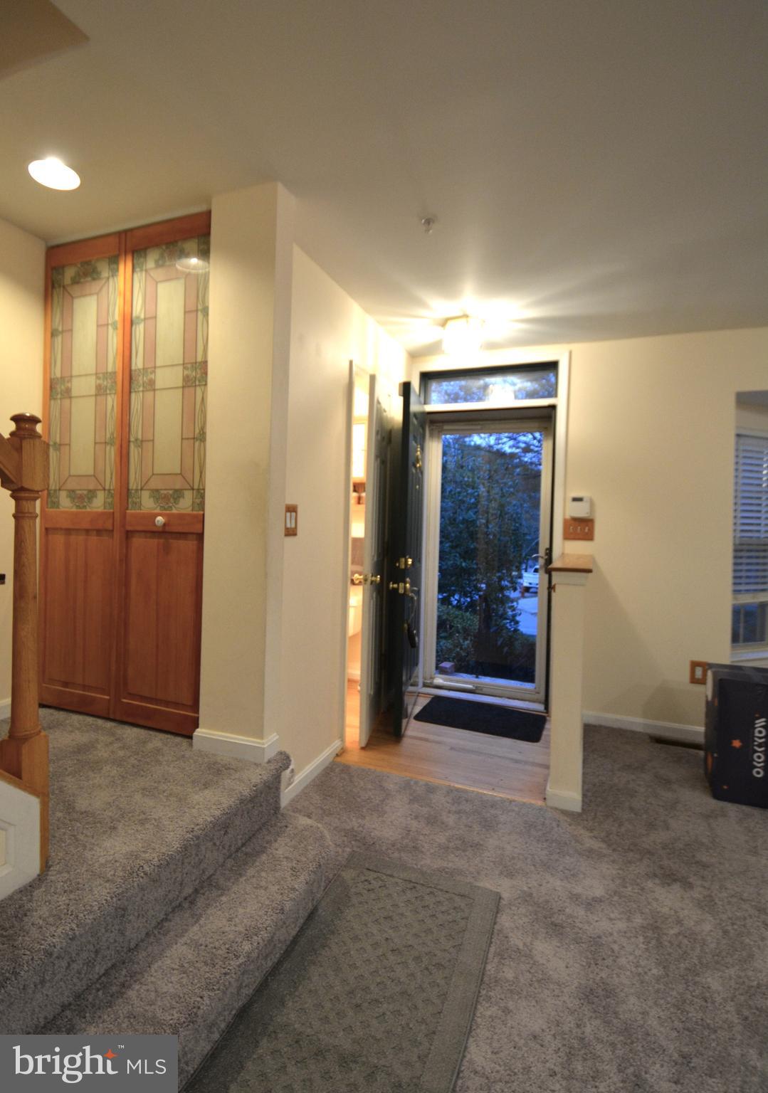4701 Wainwright Circle Owings Mills, MD 21117 - Photo 9 of 59 Entry to half bath and living room.