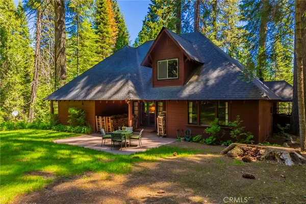 a view of a chairs and a fireplace in the room