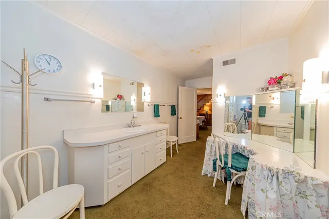 a view of hallway with washer and dryer
