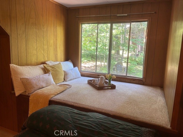 1173 Railroad Avenue Fish Camp, CA 93623 - Photo 34 of 75 a bedroom with a bed and a large window