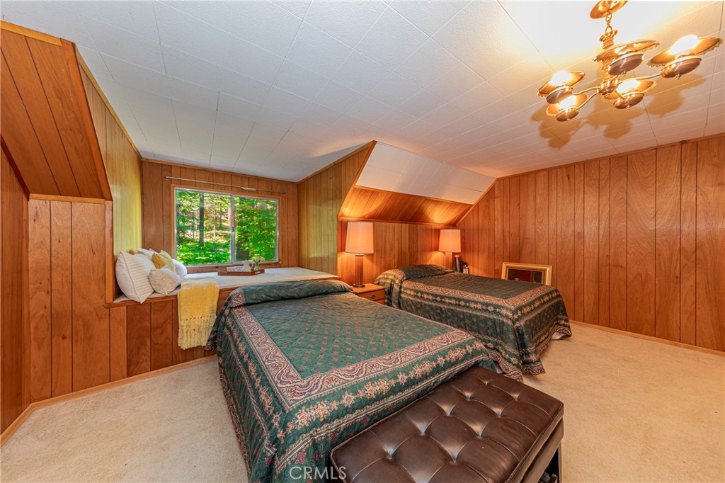 1173 Railroad Avenue Fish Camp, CA 93623 - Photo 35 of 75 a bedroom with a bed and a window