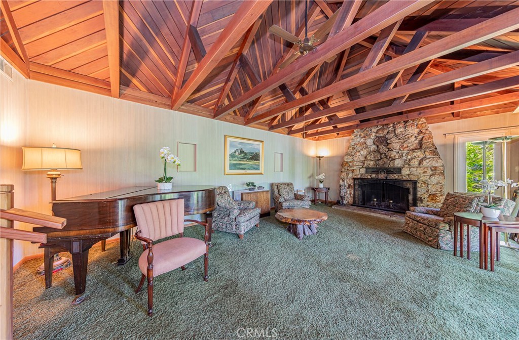 1173 Railroad Avenue Fish Camp, CA 93623 - Photo 4 of 75 a view of a chairs and a fireplace in the room