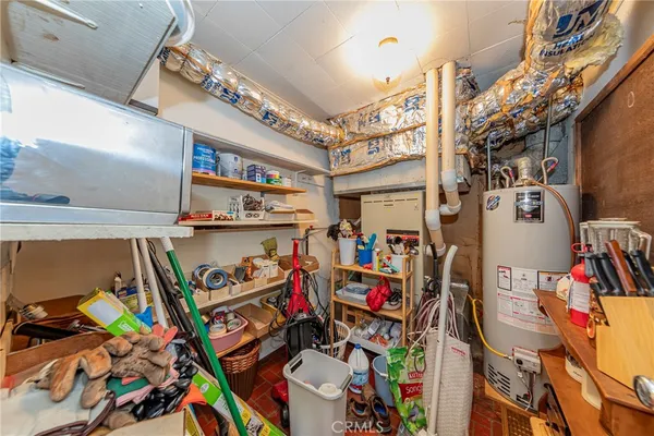 a view of a porch with furniture and garden