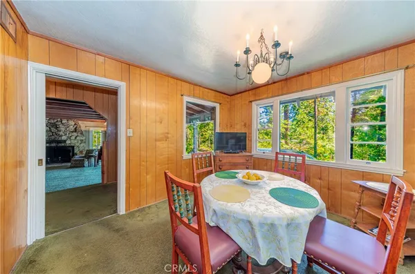 a kitchen with a refrigerator and a sink