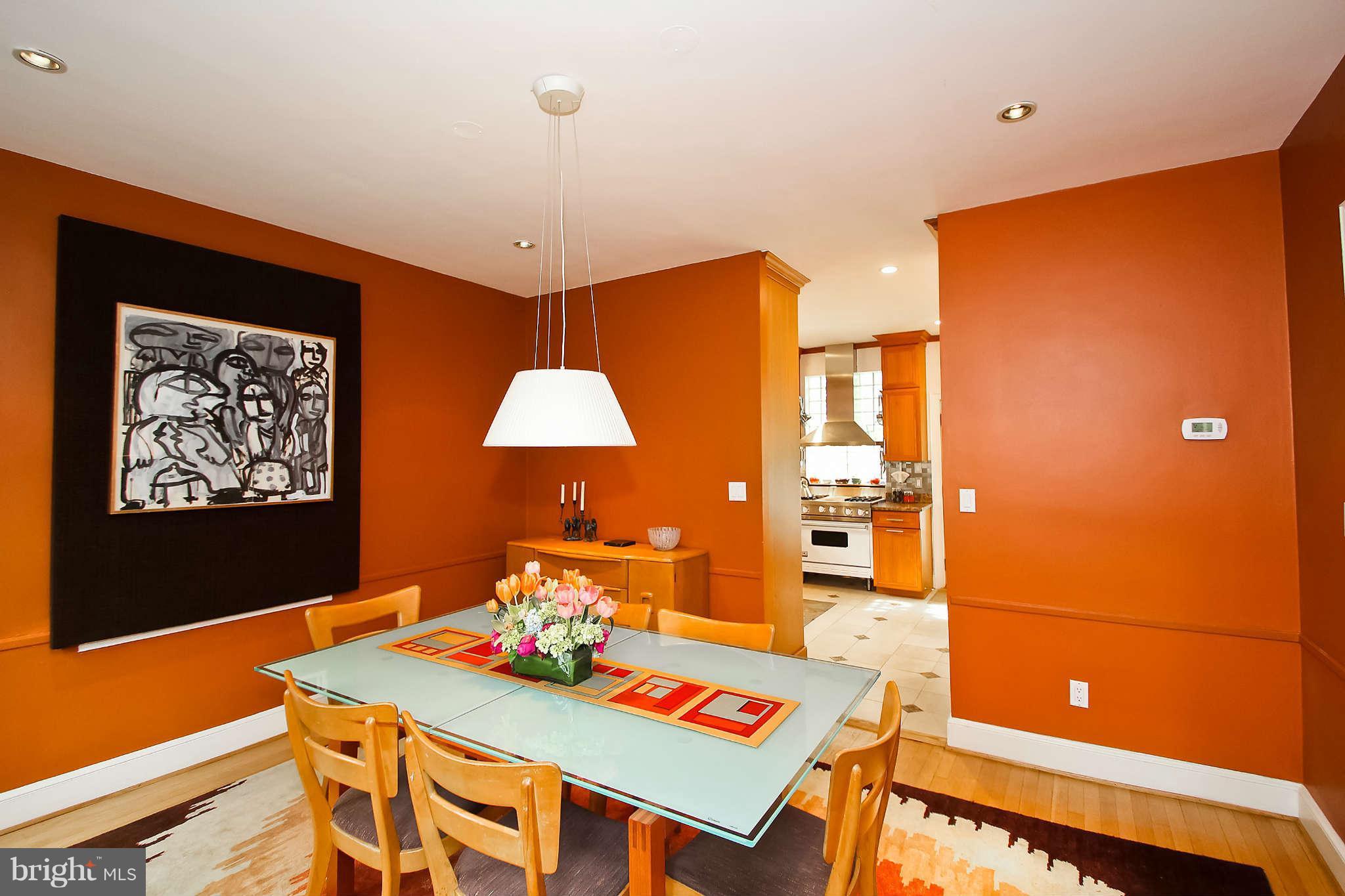 1421 Locust Road Northwest Washington, DC 20012 - Photo 12 of 30 a view of a dining room with furniture and chandelier