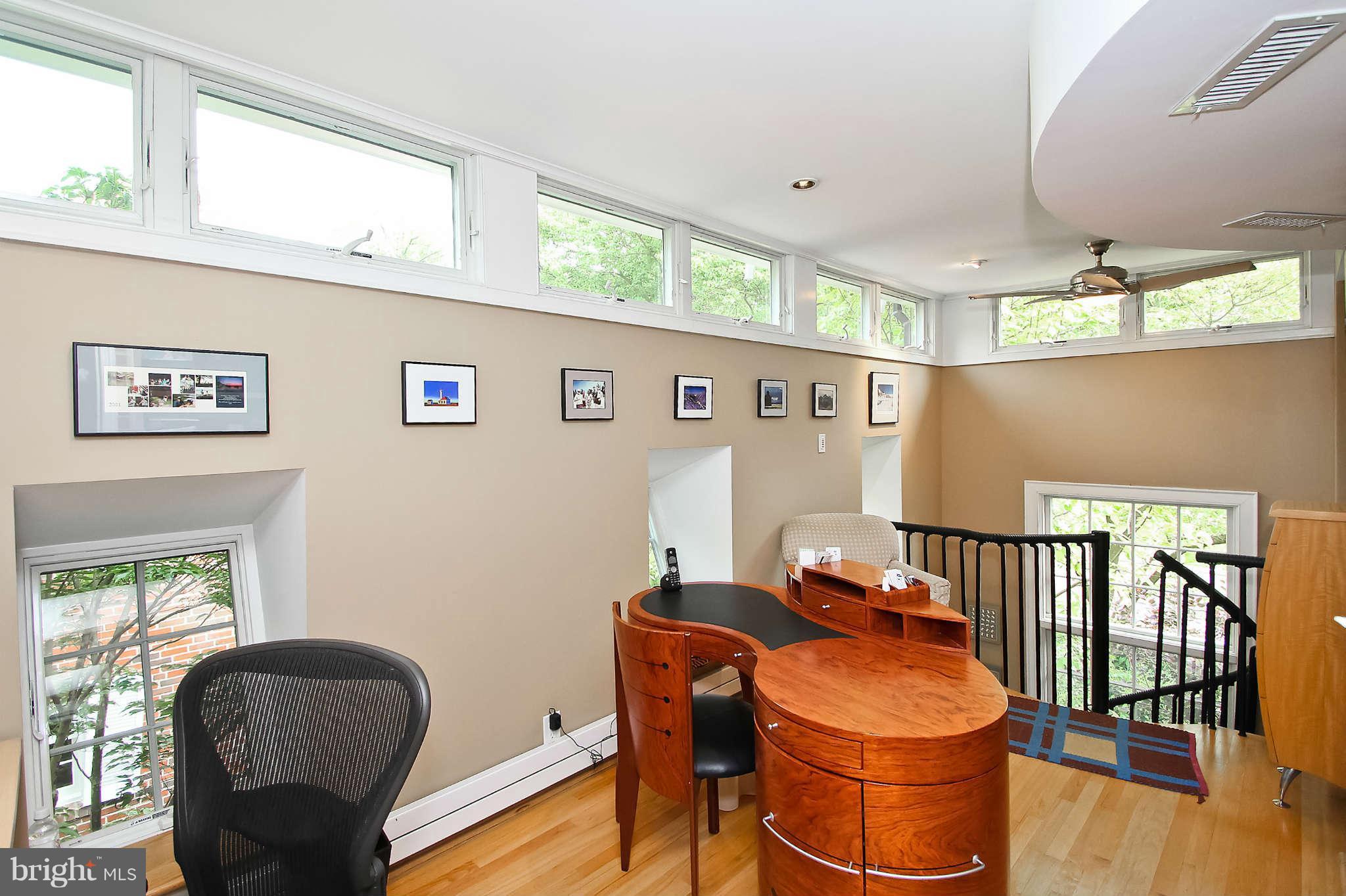 1421 Locust Road Northwest Washington, DC 20012 - Photo 19 of 30 a room with furniture and window