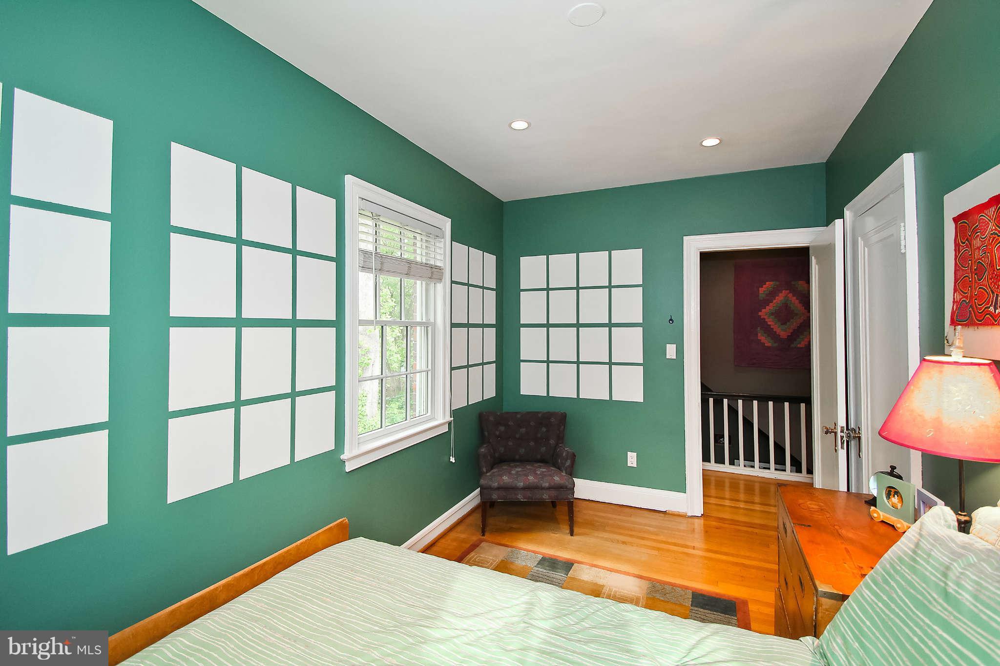 1421 Locust Road Northwest Washington, DC 20012 - Photo 23 of 30 a room with furniture and a large window