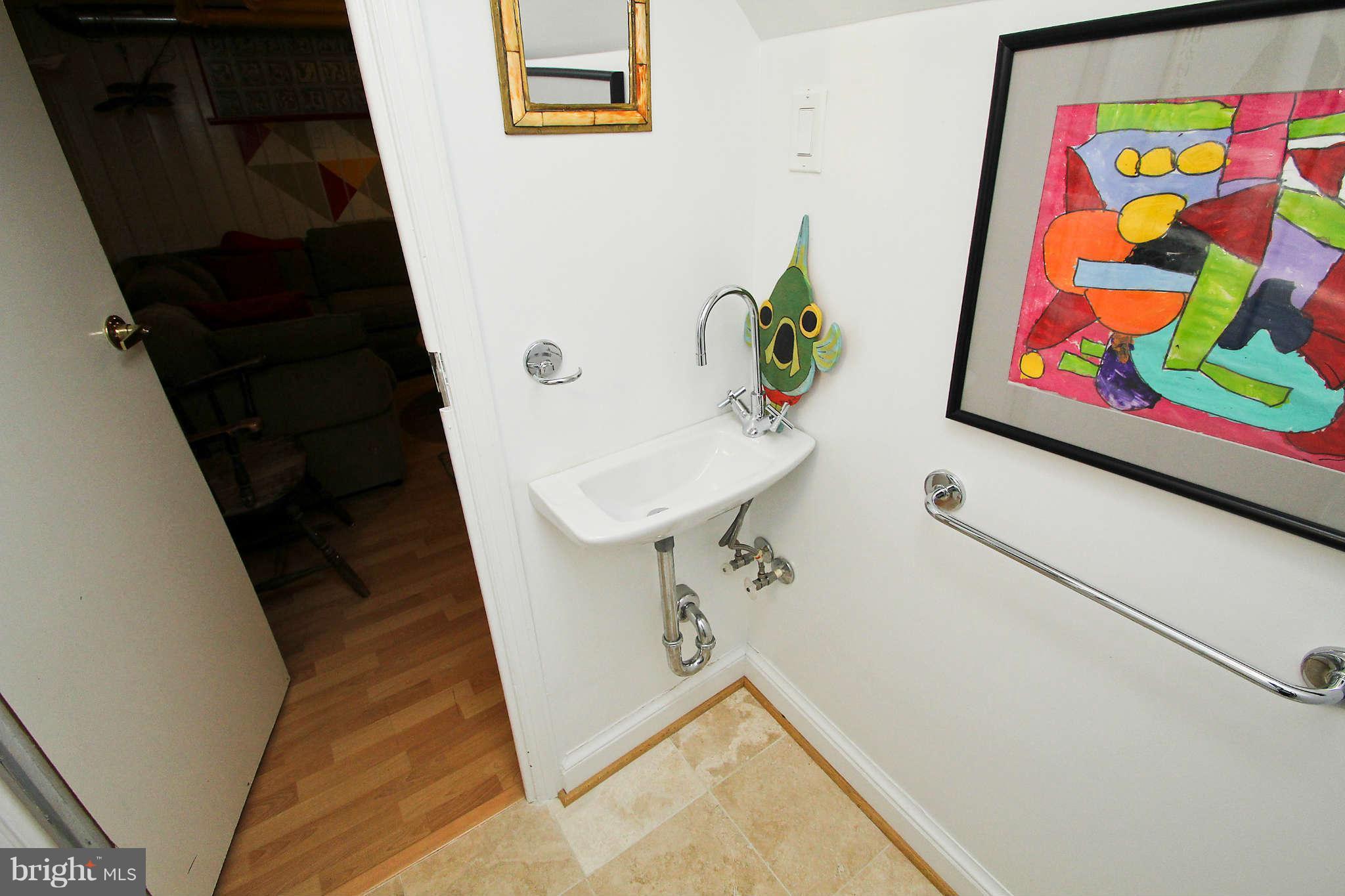 1421 Locust Road Northwest Washington, DC 20012 - Photo 29 of 30 a bathroom with a bathtub and a shower