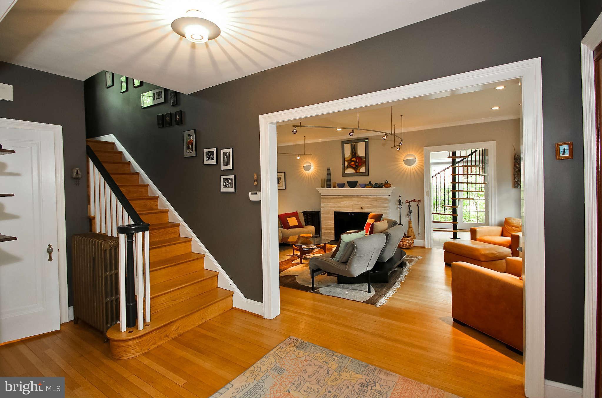 1421 Locust Road Northwest Washington, DC 20012 - Photo 6 of 30 a living room with furniture and a chandelier
