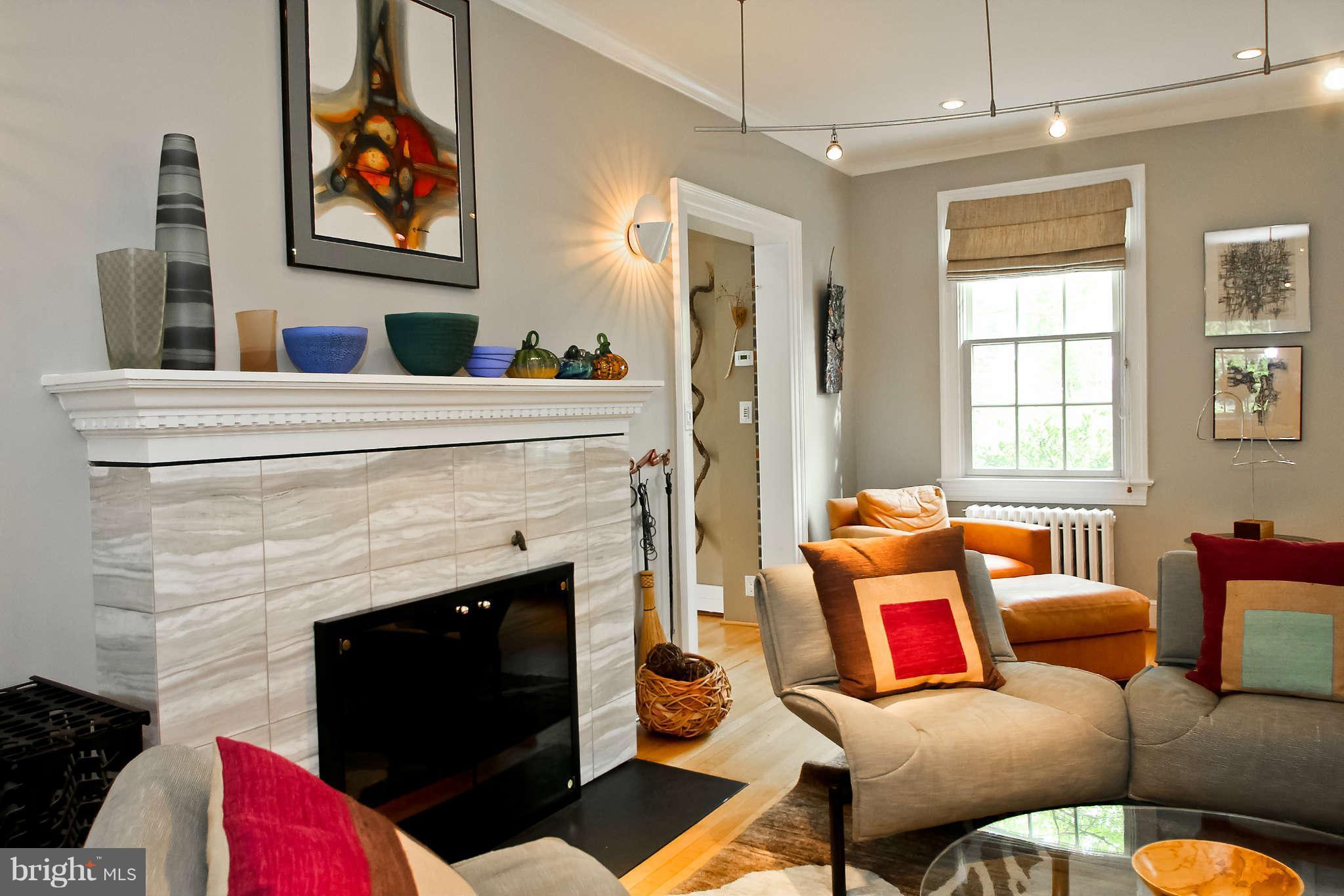 1421 Locust Road Northwest Washington, DC 20012 - Photo 8 of 30 a living room with furniture fireplace and a window