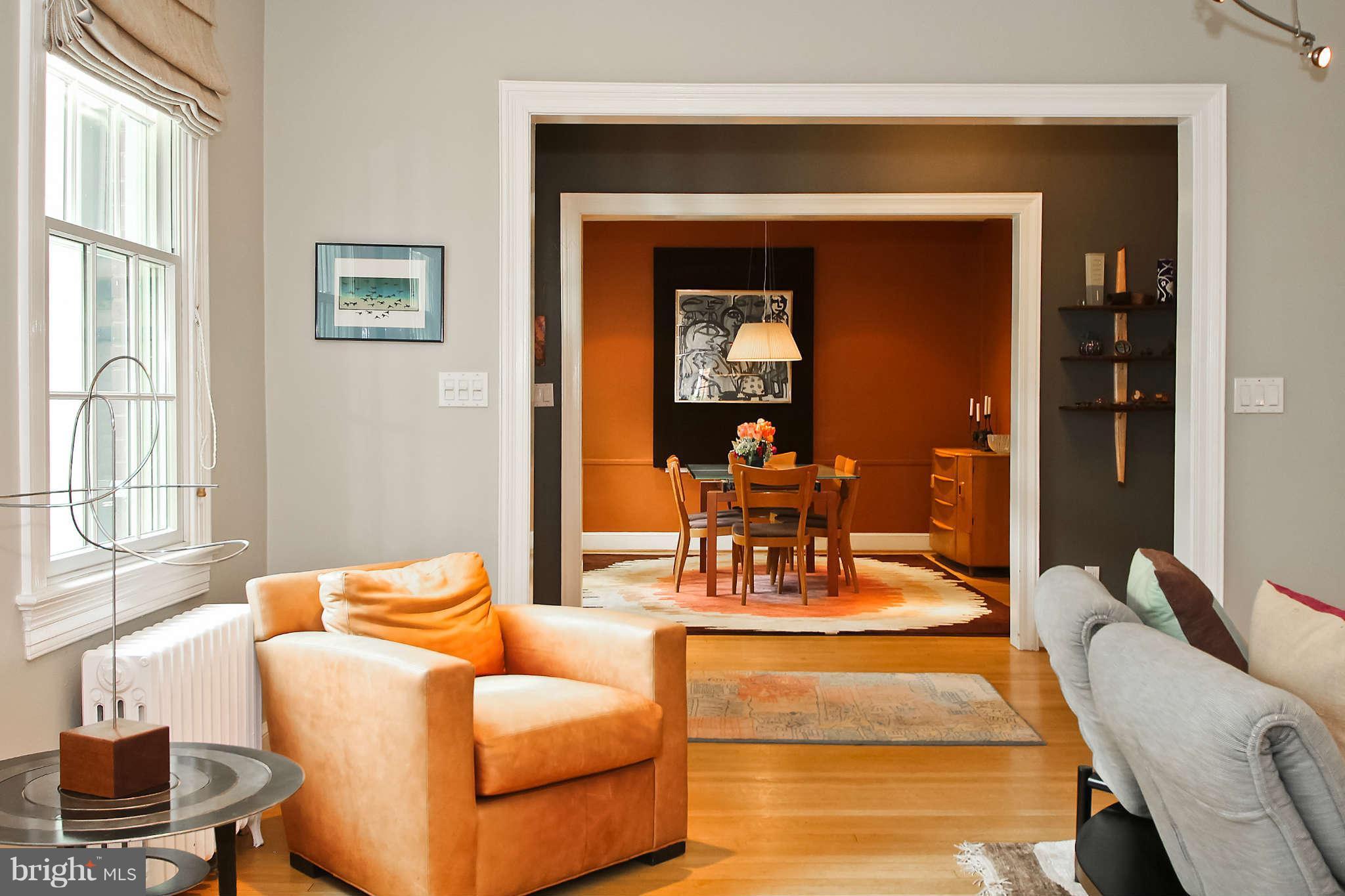 1421 Locust Road Northwest Washington, DC 20012 - Photo 9 of 30 a living room with furniture and a potted plant