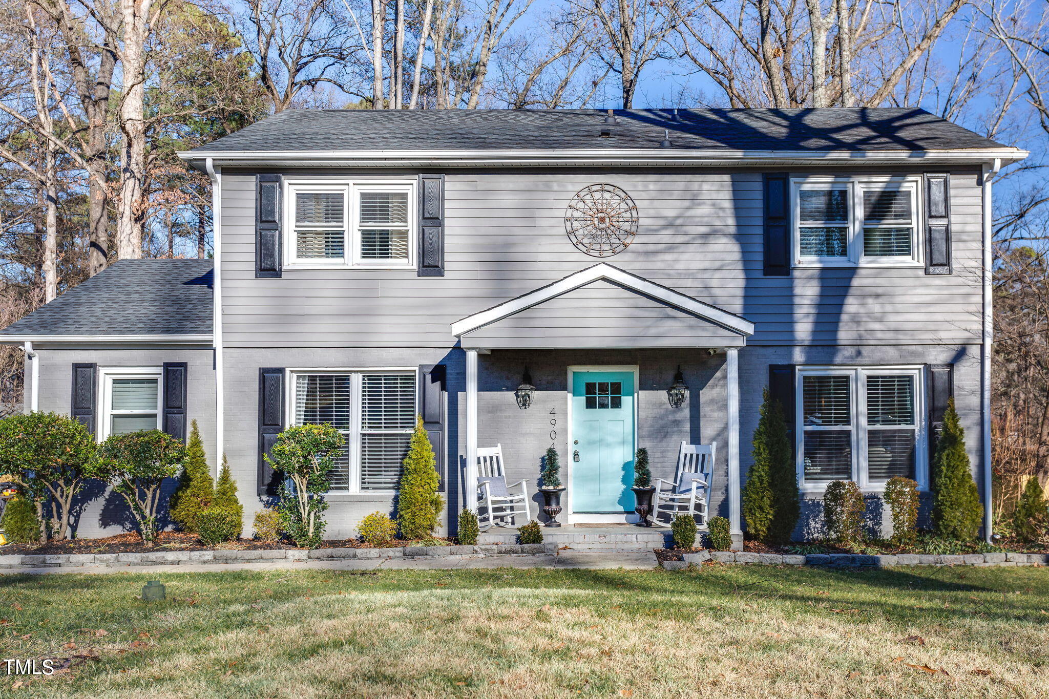 4904 Latimer Road Raleigh, NC 27609 - Photo 1 of 33 a front view of a house with a yard
