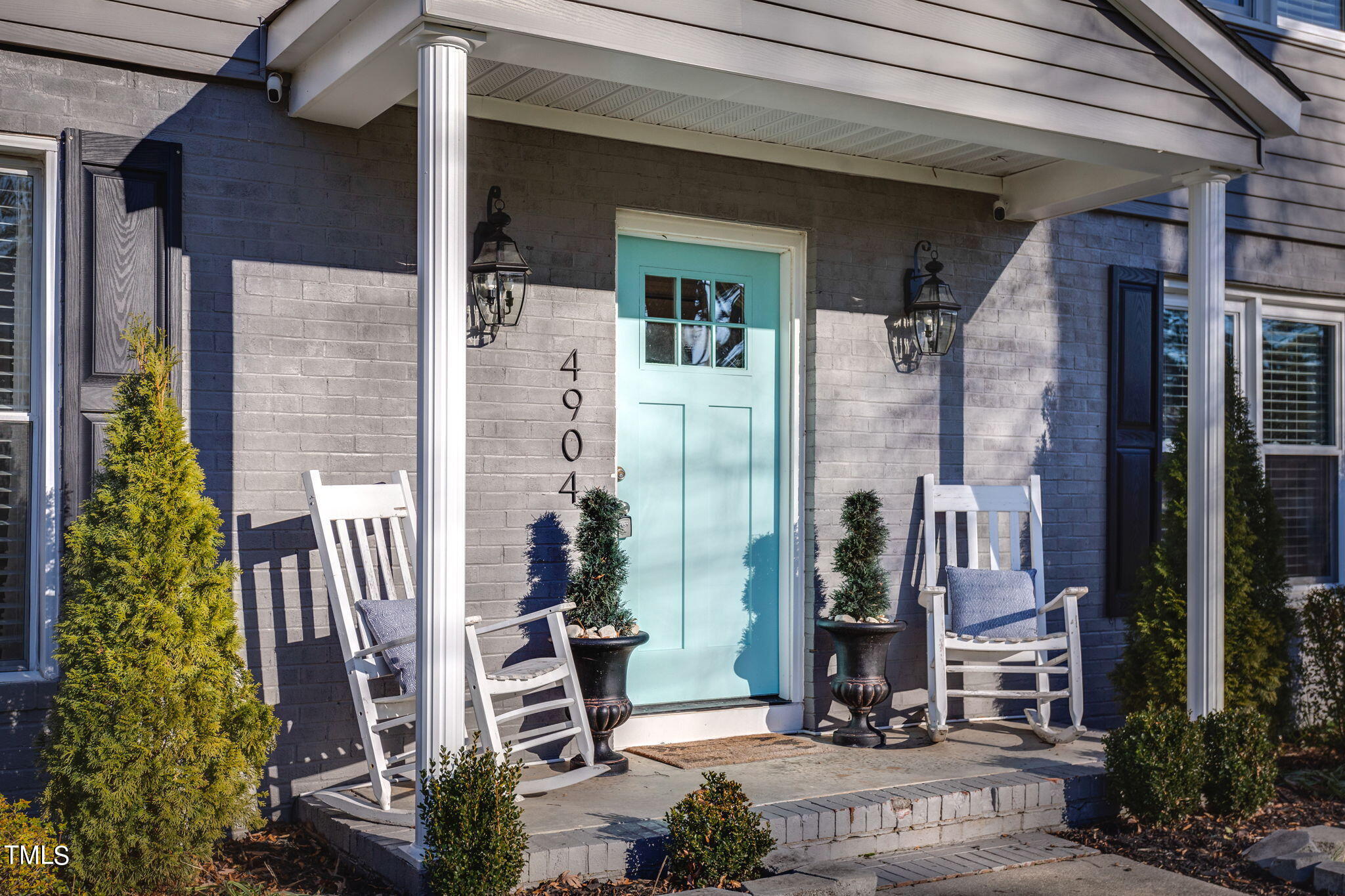 4904 Latimer Road Raleigh, NC 27609 - Photo 2 of 33 a front view of a house with a garden