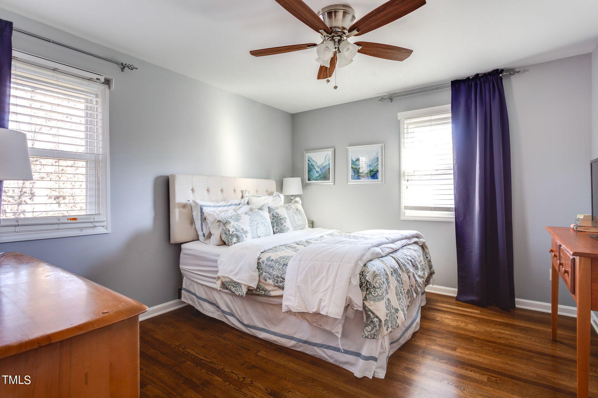 4904 Latimer Road Raleigh, NC 27609 - Photo 22 of 33 a bedroom with a bed and window