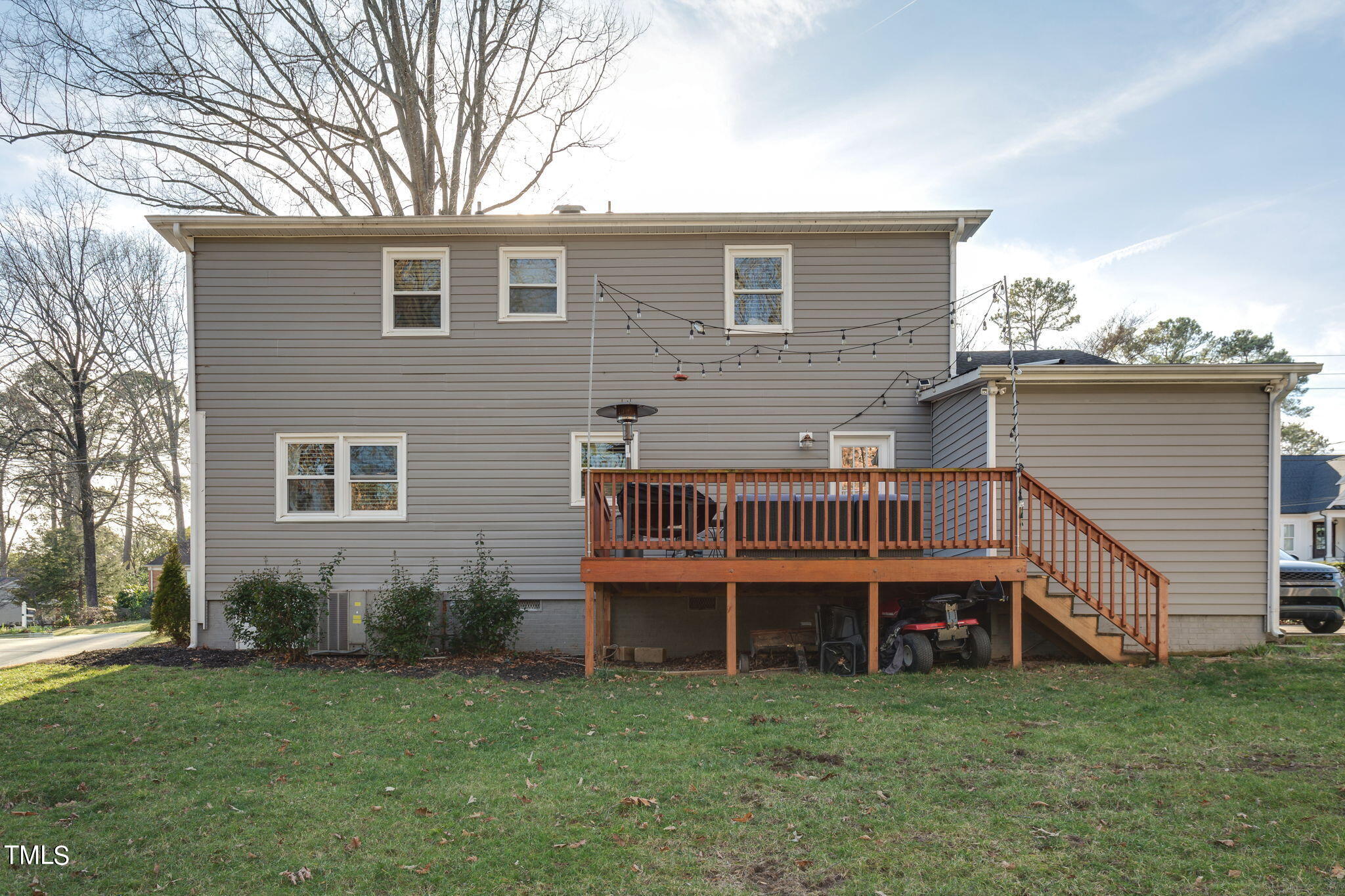 4904 Latimer Road Raleigh, NC 27609 - Photo 27 of 33 a view of a house with a yard and sitting area