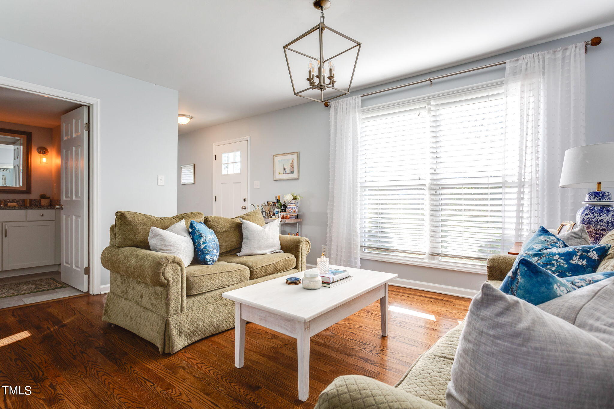 4904 Latimer Road Raleigh, NC 27609 - Photo 5 of 33 a living room with furniture and window