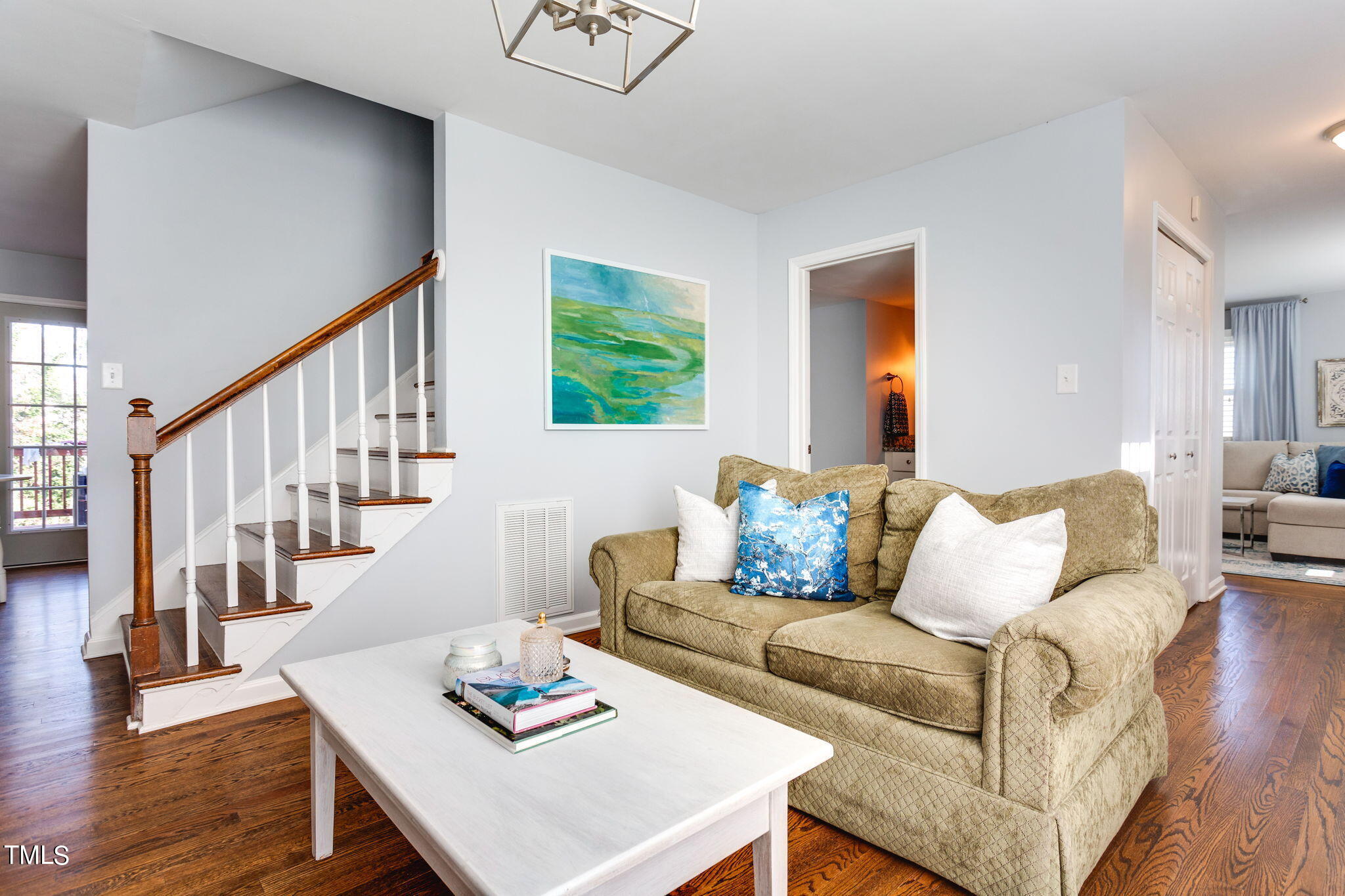 4904 Latimer Road Raleigh, NC 27609 - Photo 6 of 33 a living room with furniture and a table