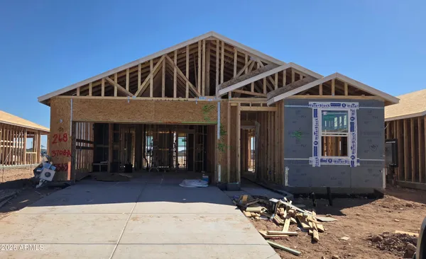 a front view of a house with garage
