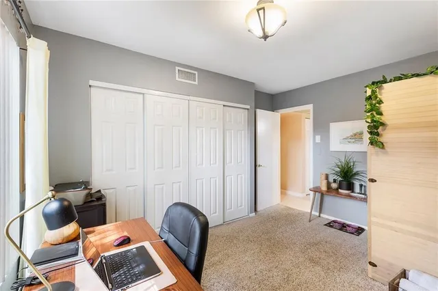 a bathroom with a toilet a sink and a shower