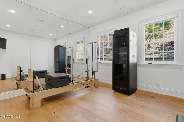 a view of a living room and hall with wooden floor