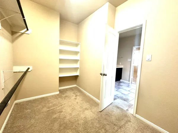 a view of a room with a door