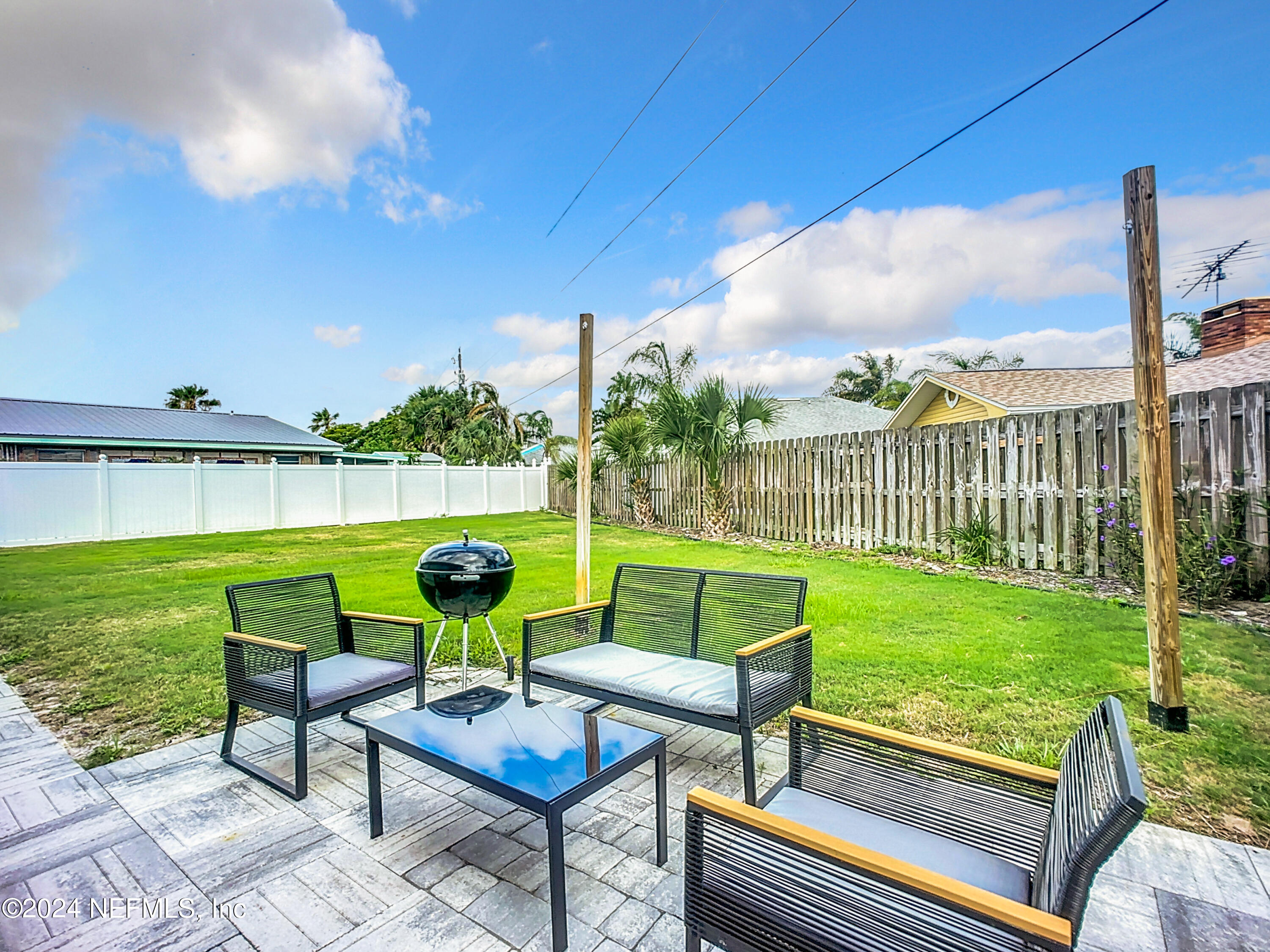 54 Surf Drive St. Augustine, FL 32080 - Photo 34 of 47 a view of a garden with furniture