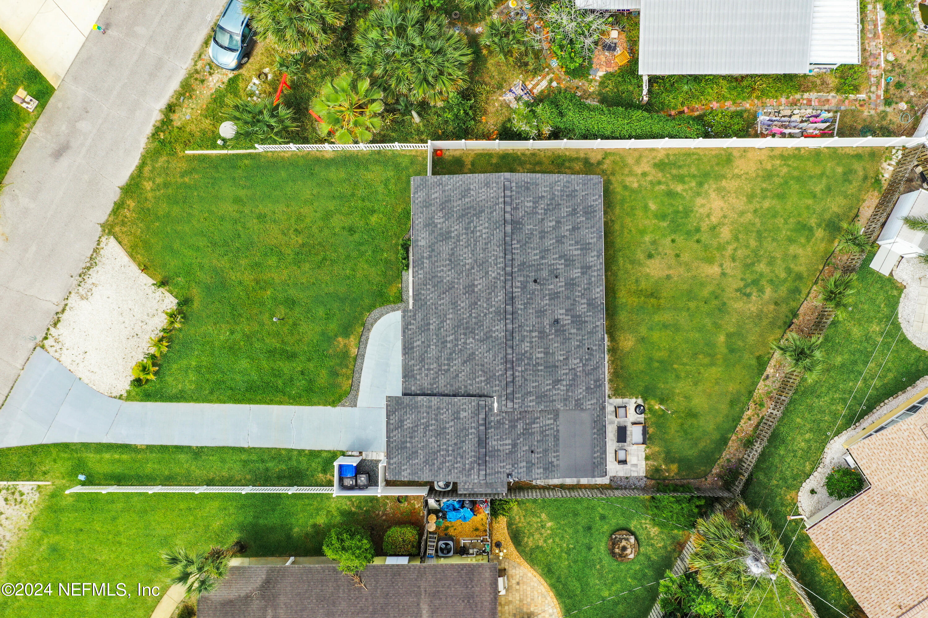 54 Surf Drive St. Augustine, FL 32080 - Photo 42 of 47 an aerial view of a house with a garden