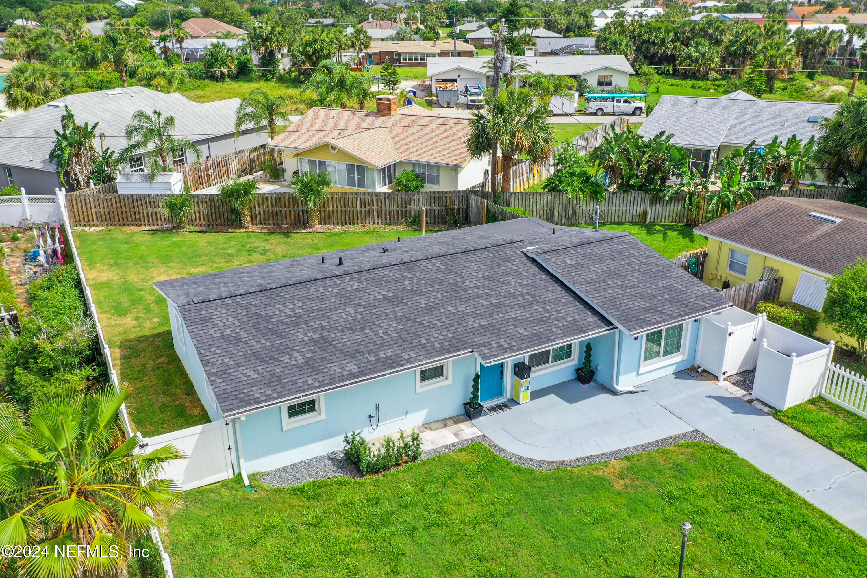 54 Surf Drive St. Augustine, FL 32080 - Photo 47 of 47 a aerial view of a house with a yard and plants